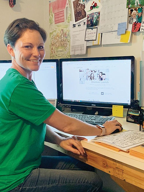 Emily Roberts, a teacher at Belair Elementary with a specialist degree in online education, prepares for summer school on the Friday following JC Schools' last day of school. 