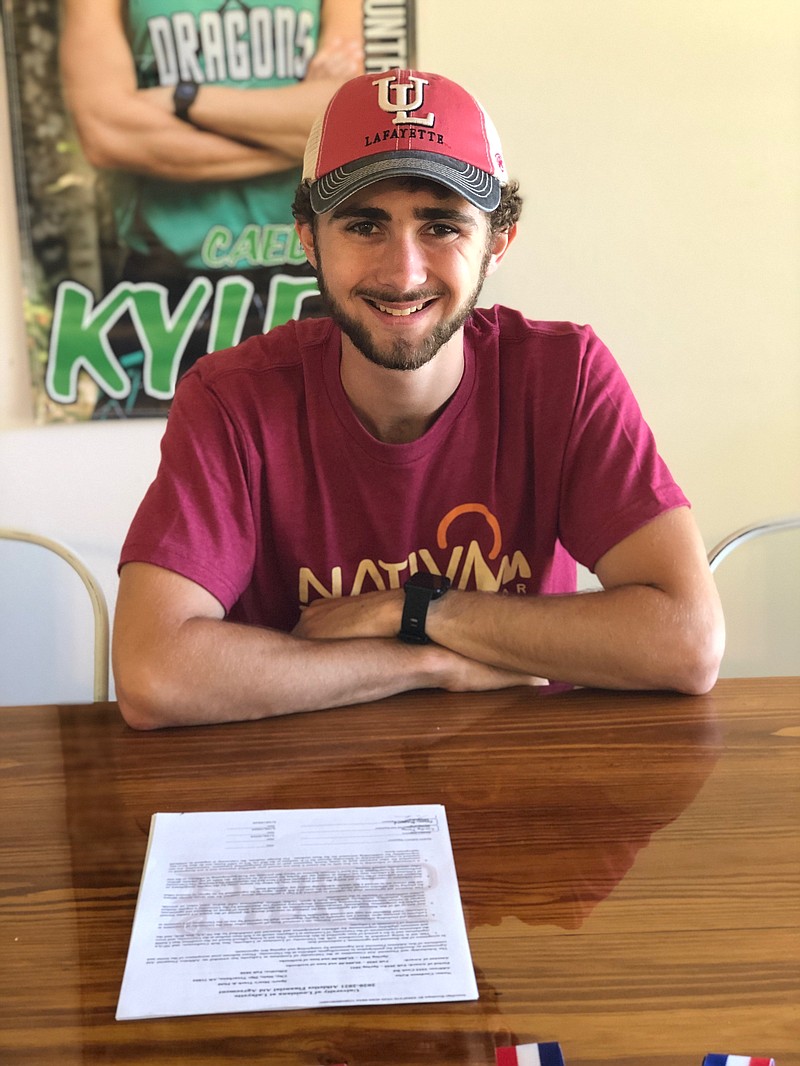 Genoa Central's Caedmon Kyles signed his letter-of-intent  Friday to join the track and field team for the University of Louisiana at Lafayette. (Submitted photo)
