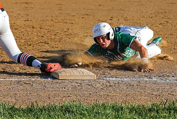 Levi Haney of Blair Oaks dives into third base during Wednesday's game against Macon at the Falcon Athletic Complex in Wardsville.