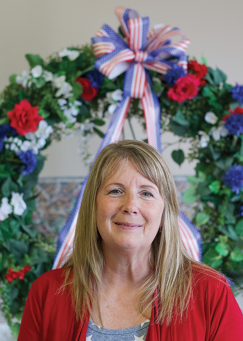 Penny Smith, pictured here in her office on Tuesday, is the event coordinator for Salute to America. This unprecedented year has brought about its own set of unprecedented challenges for Salute to America's annual events, like the 4th of July Celebration and the Concert Inside the Walls. 