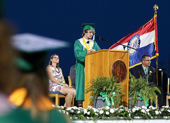 Caleb Meeks, Blair Oaks High School senior class president, gives the closing thoughts Saturday during the Class of 2020's high school graduation ceremony on the Blair Oaks High School football field. 