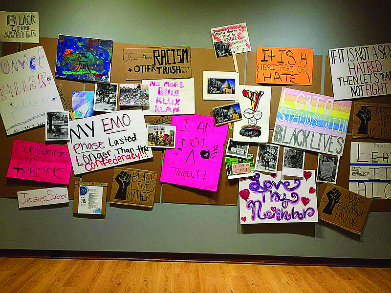 A collection of protest signs is part of "We Cannot Just Be Quiet," a new exhibit at the Regional Arts Center. The exhibit includes various forms of art and artifacts inspired by recent protests.