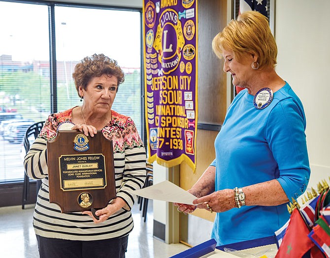 During Wednesday's regularly scheduled meeting of the Jefferson City Host Lions Club, longtime member Janet Ousley was presented with the Melvin Jones Award by Janice Bonnot. The recognition is named for the man whose philosophy was "You can't get very far until you start doing something for somebody else" and is the underlying ideal for Lions Club International and individual Lions Clubs. This meeting served as the installation and recognition meeting and was the first time the Host Lions Club has met as a group in four months. Their meetings are in the community room at Hy-Vee on Jefferson City's west side.