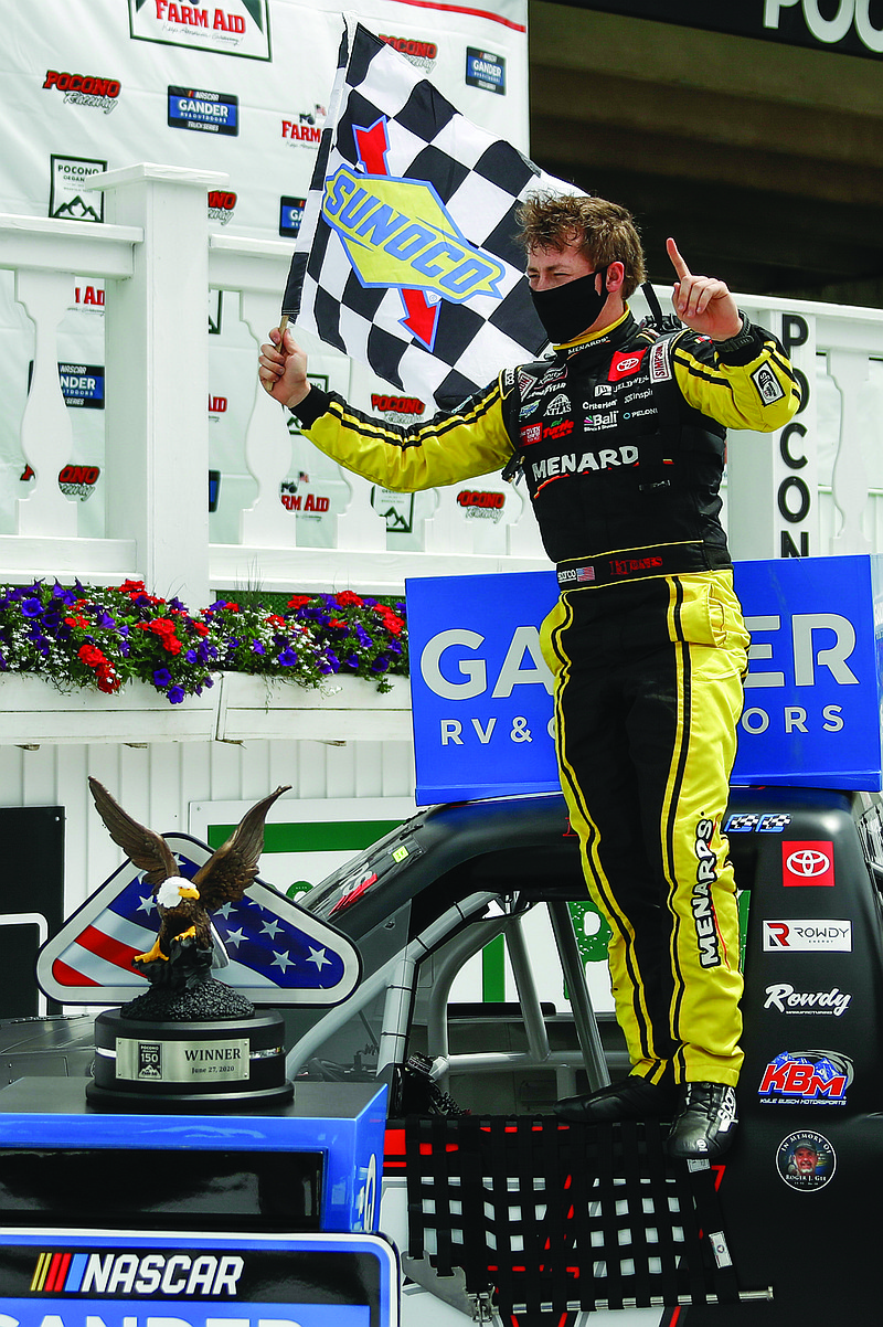 Brandon Jones celebrates after winning Sunday's NASCAR Truck Series race at Pocono Raceway in Long Pond, Pa.