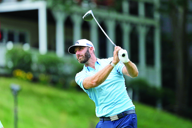 Dustin Johnson tees off on the 18th hole during Sunday's final round of the Travelers Championship at TPC River Highlands in Cromwell, Conn.