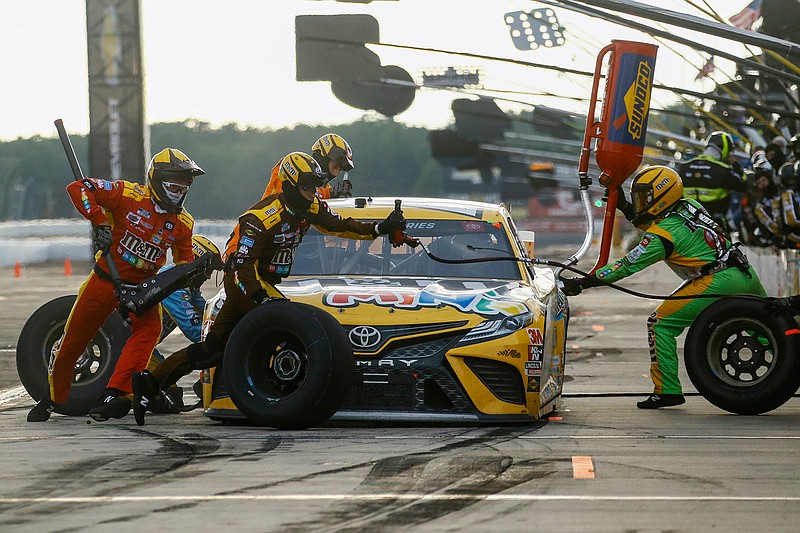 Kyle Busch makes a pit stop during the NASCAR Cup Series auto race Sunday, June 28, 2020, at Pocono Raceway in Long Pond, Pa.