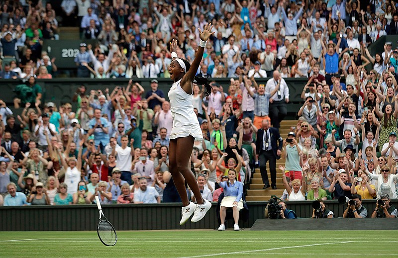 In this Friday, July 5, 2019, file photo, United States' Cori "Coco" Gauff celebrates after beating Slovenia's Polona Hercog in a women's singles match during day five of the Wimbledon Tennis Championships in London. (AP Photo/Ben Curtis, File)