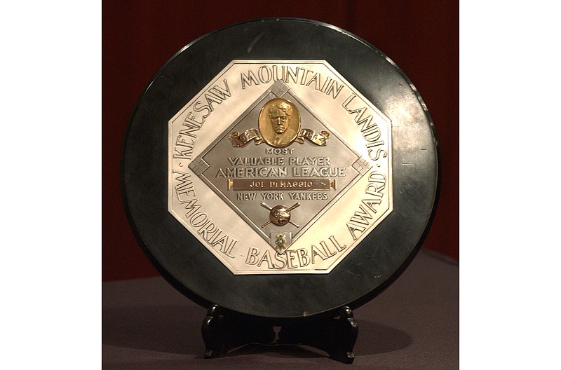 In this Jan. 22, 2006, file photo,a  Joe DiMaggio 1947 MVP Award Plaque is displayed at a news conference in New York. The plaque features the name and image of Kenesaw Mountain Landis. (AP Photo/Jennifer Szymaszek, File)