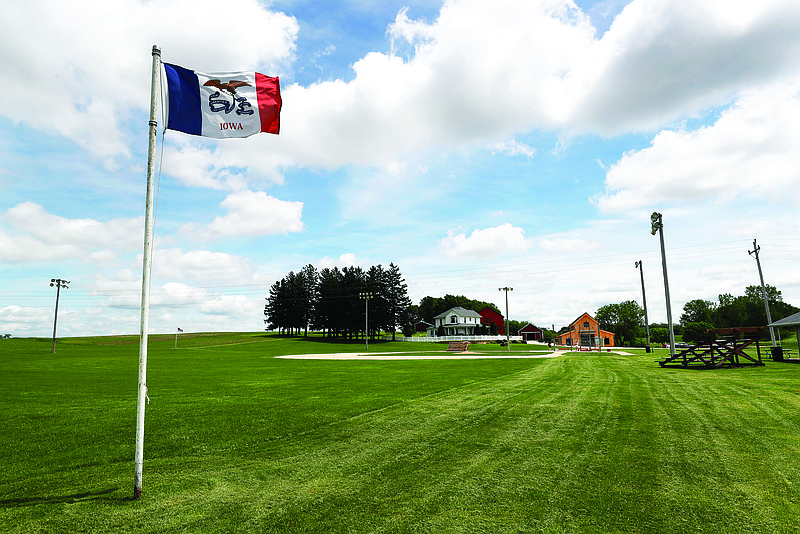 In this June 5 file photo, an Iowa flag waves in the wind over the field at the Field of Dreams movie site in Dyersville, Iowa. The Cardinals have replaced the Yankees as the opponent for the White Sox in the Field of Dreams game Aug. 13 at Dyersville.