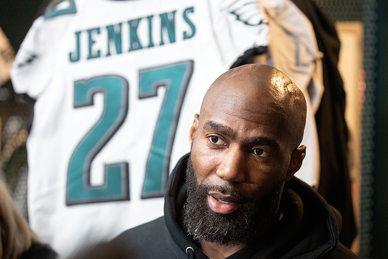  In this Jan. 6, 2020, file photo, Philadelphia Eagles strong safety Malcolm Jenkins speaks with members of the media at the NFL football team's practice facility in Philadelphia. NFLPA president JC Tretter warned players they have to "fight for necessary COVID-19 protections" and Malcolm Jenkins said "football is nonessential." With training camp less than a month away, some players are speaking out about concerns over playing football during a pandemic while others are ignoring medical advice and holding workouts with teammates. (AP Photo/Matt Rourke, FIle)