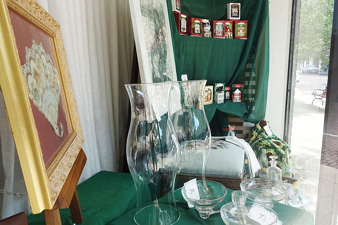 Bidding is open now for the Kingdom of Callaway Historical Society's annual silent auction. Items include glassware, a wooden cooler, a metal stove, collectible ornaments and more.