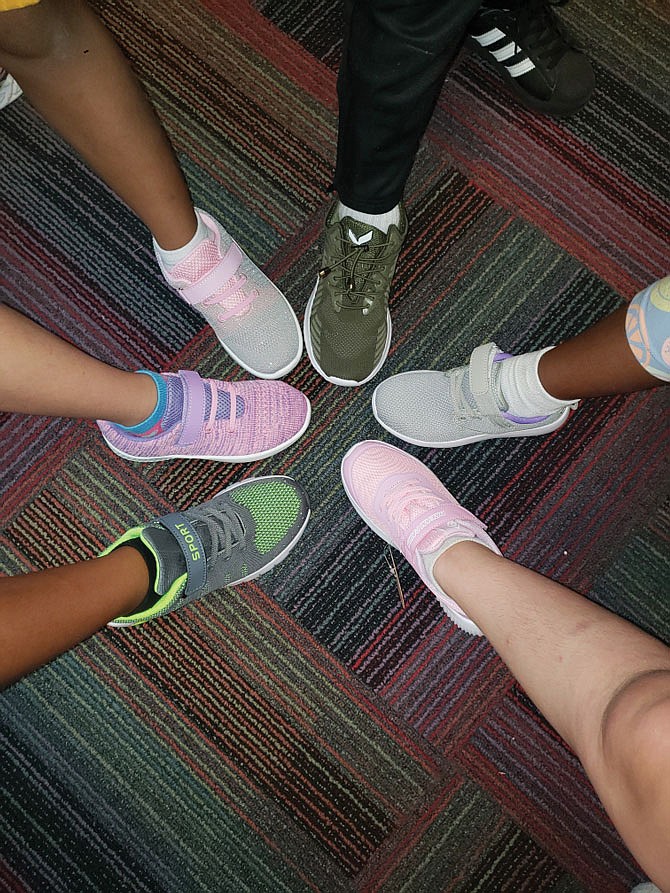 The Sneaker Project distributed 36 pairs of new shoes to students this week at the Boys & Girls Club of Jefferson City.