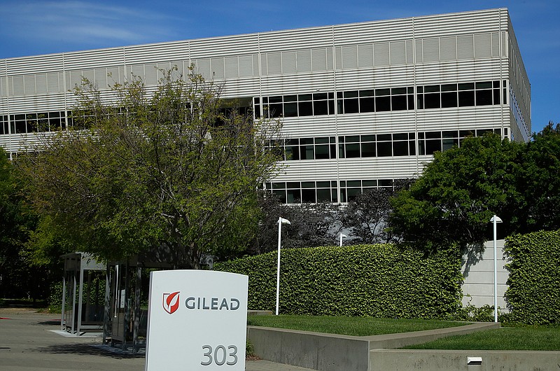 This is an April 30, 2020, file photo showing Gilead Sciences headquarters in Foster City, California, USA.  The U.S. government announced Tuesday June 30, 2020, that President Donald Trump had struck "an amazing deal" to buy the drug remdesivir for Americans, made by Gilead Sciences, but Health experts on Wednesday slammed the U.S. decision to hog nearly the entire global supply. (AP Photo/Ben Margot, File)