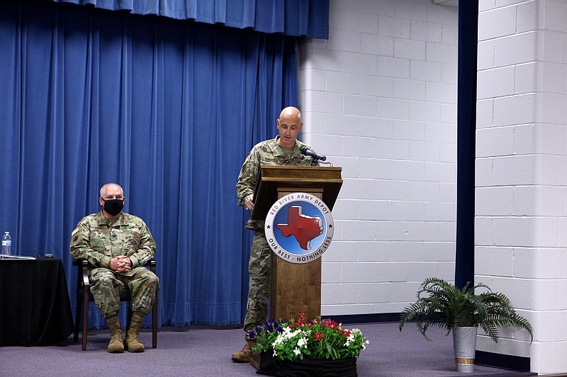 Col. Jack W. Kredo, RRAD commander, speaks to the audience during the depot's change of command ceremony. Col. Stephen M. York, left, relinquished command of the depot Wednesday morning following a two-year tenure. (Submitted photo)

