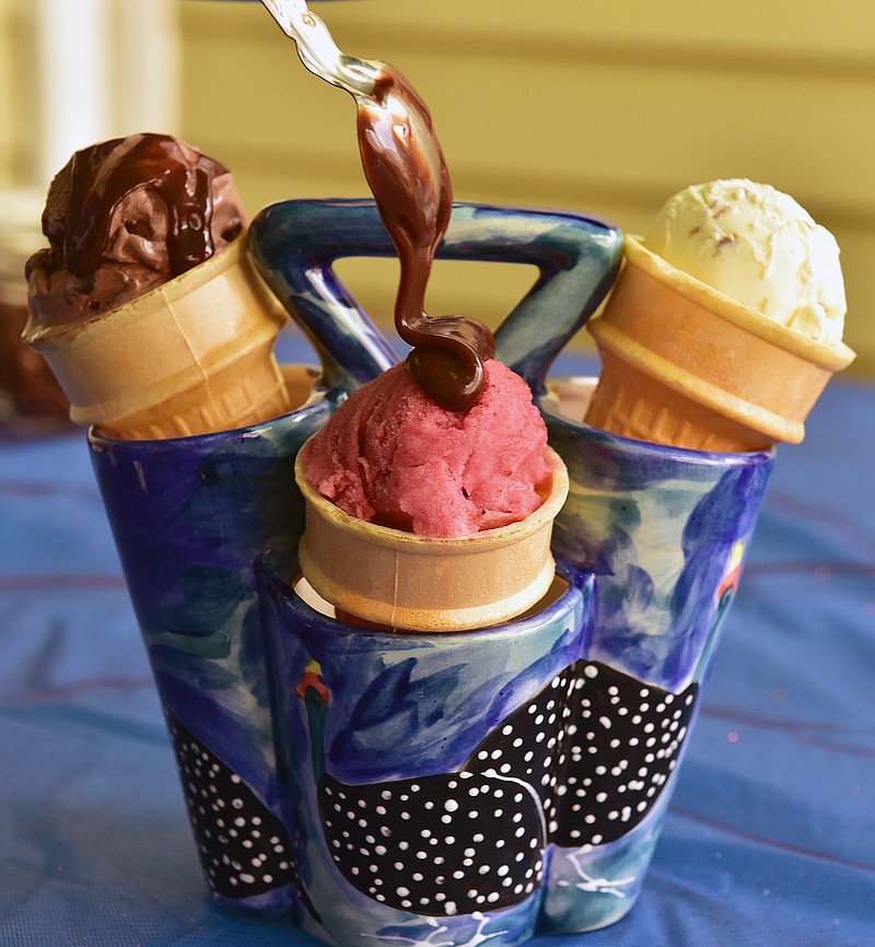 Nutella fudge sauce can be crowned with sprinkles, pretzels or pistachios and served with a variety of ice creams, like chocolate, hibiscus-rhubarb sorbet and banana ice creams pictured here.

 (Lucy Schaly/Pittsburgh Post-Gazette/TNS)