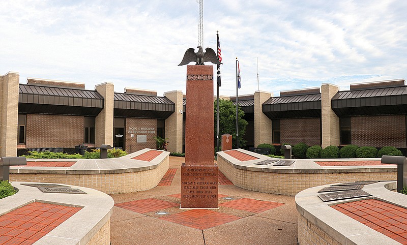 An overcast sky looms over the Veteran's Plaza in front of the Jefferson City Police Department on July 20, 2020.