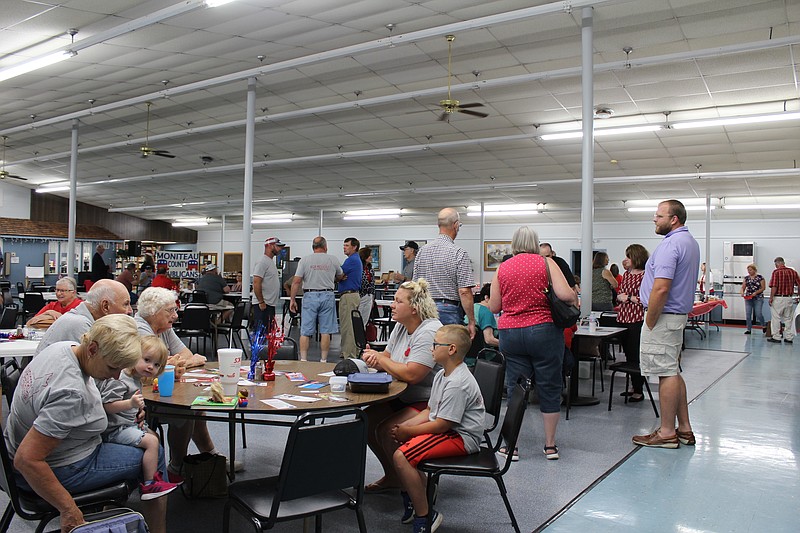 <p>Democrat photo/Austin Hornbostel</p><p>A healthy crowd, adhering to social distancing between tables, was present for the Moniteau County Republican Club’s annual picnic last week. Attendees heard from a variety of candidates running in contested races in the upcoming Aug. 4 election.</p>
