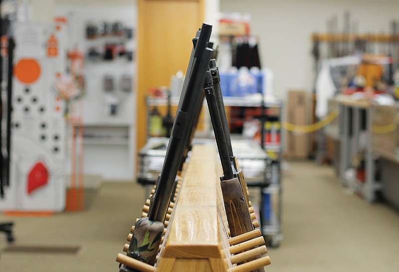 A mostly-empty rack that usually holds automatic rifles stands Tuesday in the middle of Boggs Creek, Inc. With demand for guns and ammo going up in the midst of the coronavirus pandemic, firearm shops like Boggs Creek, Inc. are struggling to keep up their supply.