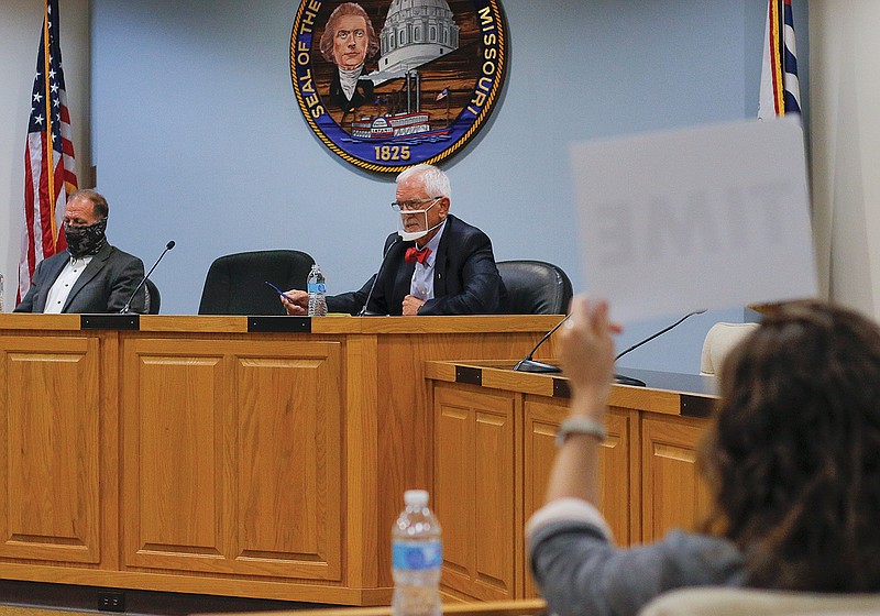 Gary Bemboom and Harry Otto make opening remarks during the Cole County Western District Commissioner candidate forum Thursday at the John G. Christy Municipal Building. The third candidate in the race, incumbent Kids Scheperle, was not able to attend the forum.