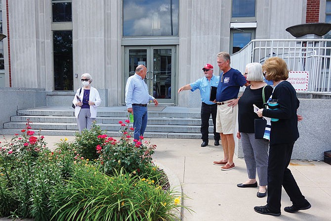 Members of the Callaway 200 committee and the Callaway County Commission eye a potential spot for the planned Callaway 200 monument. The flowerbed in front of the county courthouse already contains several monuments and seemed like a natural choice.