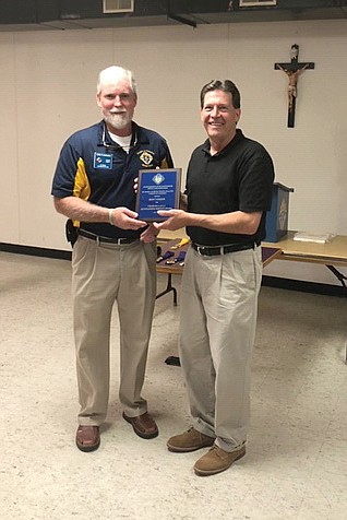 Mike Flanagan of Father Helias Knights of Columbus Council 1054 in Jefferson City awards Ron Vossen, right, with the organization's Charles J. Kolb Lifetime Achievement Award in July 2020.