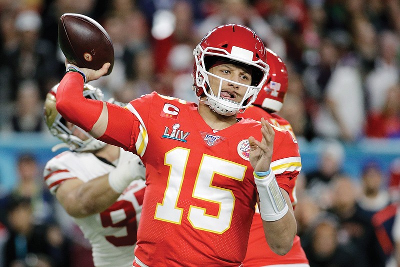 In this Feb. 2 file photo, Chiefs quarterback Patrick Mahomes throws a pass against the 49ers in Super Bowl LIV in Miami Gardens, Fla.