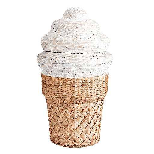 This undated photo shows Pottery Barn Teen's Ice Cream Cone Hamper. Pottery Barn Teen makes tidying up a pleasant job with this 30" tall water hyacinth storage hamper shaped like an ice cream cone.  Ice cream is one of summer's pleasures. So why not lift moods and have a little decor fun this season by bringing some ice-creamy colors into your living space? Interior design experts say you can get that summery vibe with a few accessories or a can of paint or roll of wallpaper. (Pottery Barn Teen via AP)