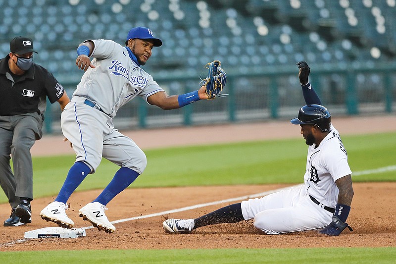 Royals third baseman Maikel Franco prepares to tag the Tigers' Niko Goodrum on his steal attempt during the fifth inning of Tuesday's game in Detroit.