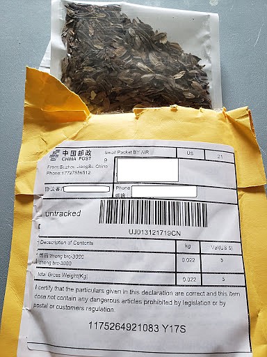 This undated photo shows a package with a Chinese return address, which contained a package of seeds. Agriculture officials across the U.S. are warning anyone who receives one of the unsolicited packages not to plant or throw away the seeds and instead contact investigators.