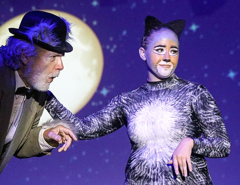 Greta Cross/News Tribune
Colby Arnold as young Mr. Mistoffelees guides elder Mr. Mistoffelees around the stage during Capital City Production’s “Cats” dress rehearsal Wednesday evening. The show opens tonight and will run through Saturday, August 1.