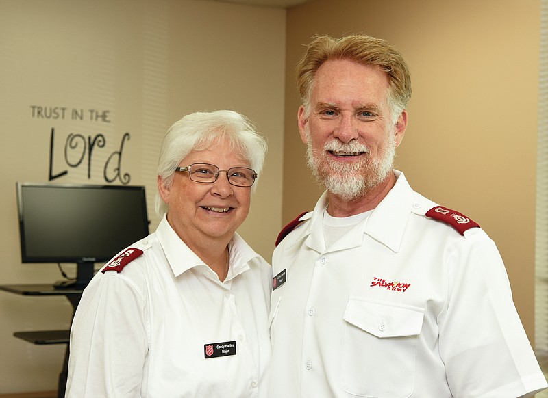 Julie Smith/News Tribune
Majors Sandy and Curtiss Hartley pose for a photograph at The Salvation Army Center of Hope.