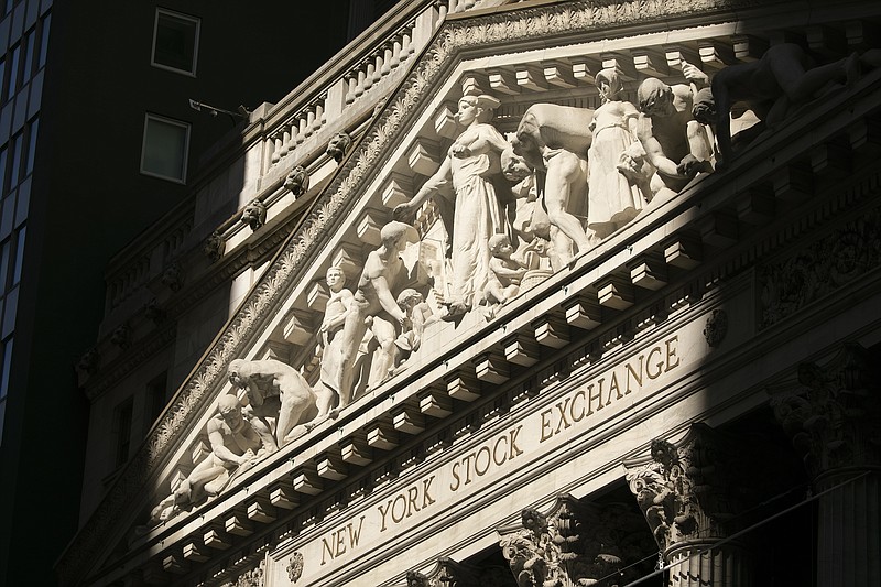 The New York Stock Exchange is shown, Tuesday, July 21, 2020.   Stocks are holding on to their gains, Wednesday, July 29,  on Wall Street after the Federal Reserve said it will keep the accelerator floored on its aid for the economy. (AP Photo/Mark Lennihan)