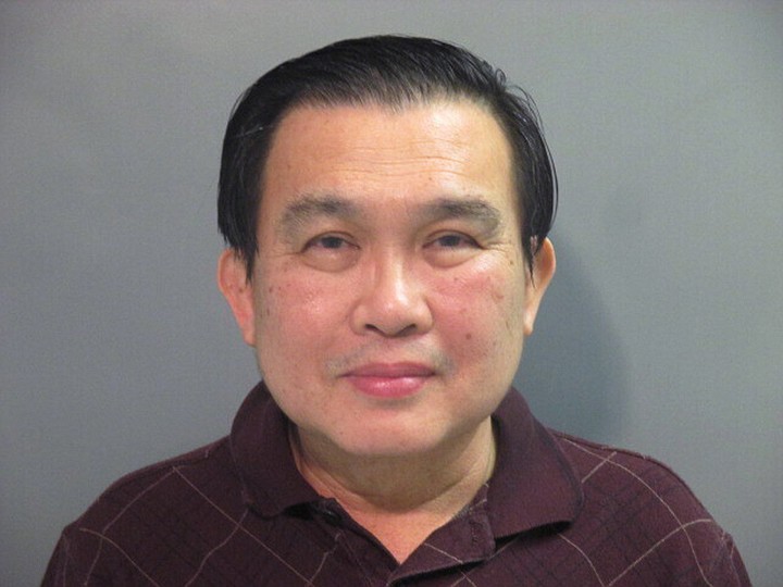 FILE - In this undated file photo provided by the Washington County (Ark.) Detention Center shows Simon S. Ang. Ang, a suspended University of Arkansas professor was indicted in Fayetteville, Arkansas, Tuesday, July 28, 2020, on multiple wire and passport fraud counts. The 44-count indictment accuses Ang, of failing to disclose close ties to the Chinese government and Chinese companies when he obtained federal grants. (Washington County Detention Center via AP, File)