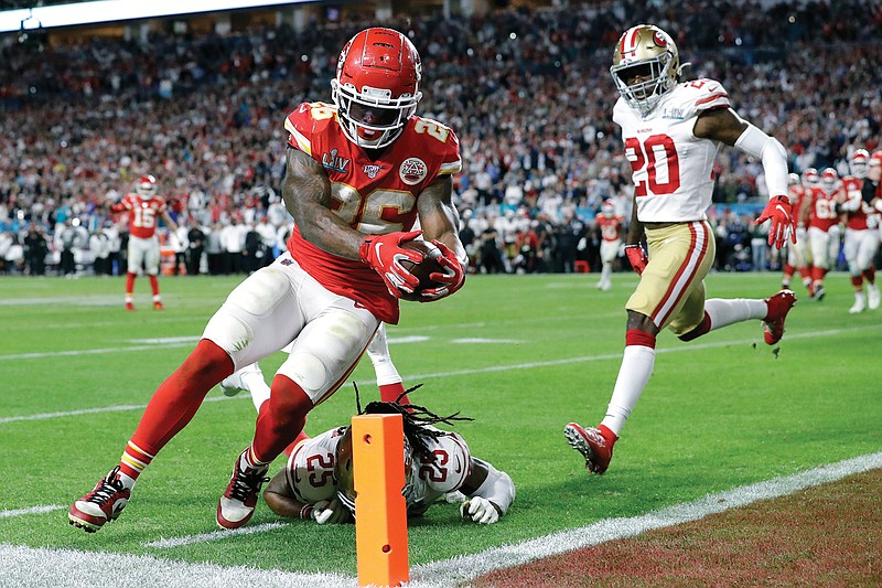 In this Feb. 2 file photo, Chiefs running back Damien Williams scores a touchdown against the 49ers during the second half of Super Bowl LIV in Miami Gardens, Fla.