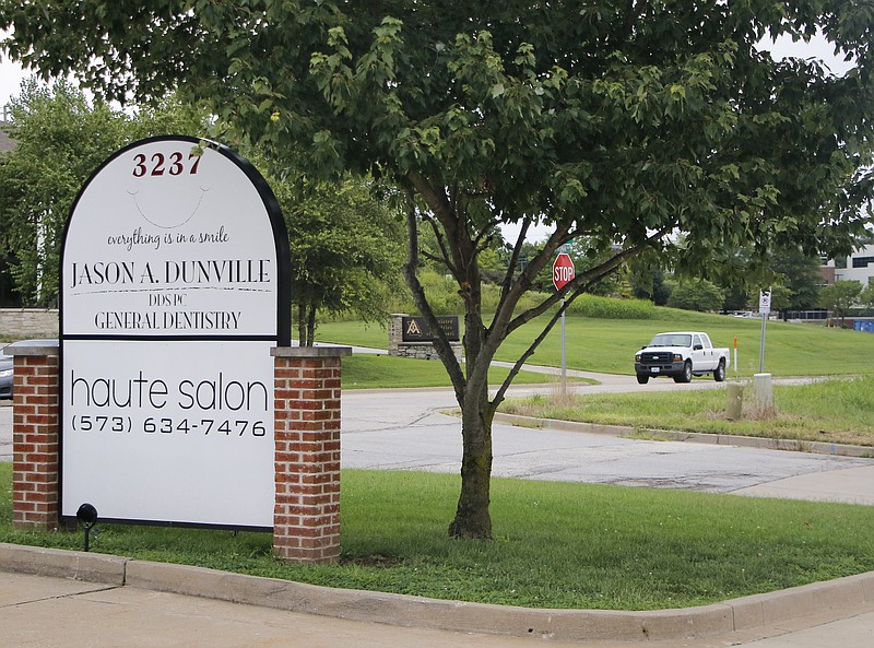 Liv Paggiarino/News Tribune

Haute Salon’s new sign is displayed Friday at its new address on Truman Boulevard. The salon is set to open on Wednesday, Aug. 5.