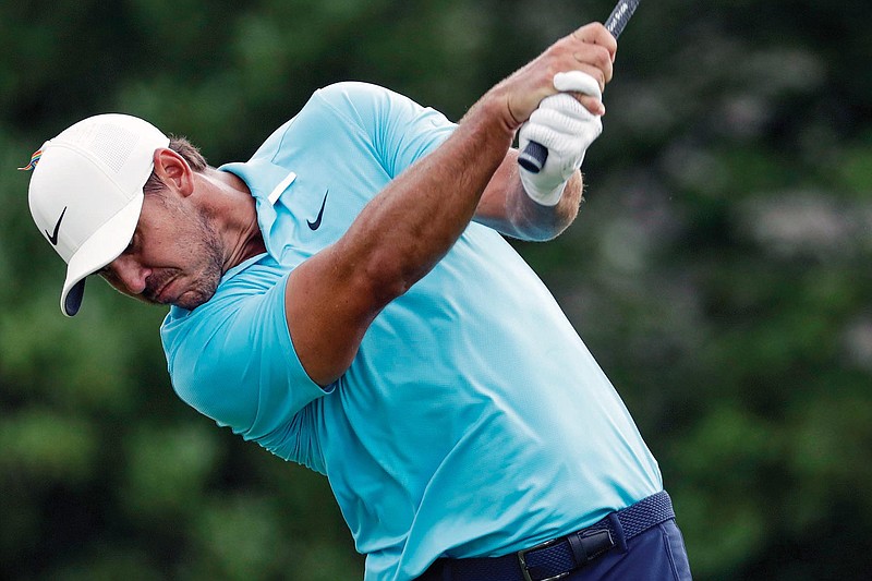 Brooks Koepka follows through on his tee shot on the 18th hole during Thursday's first round of the World Golf Championship-FedEx St. Jude Invitational in Memphis, Tenn.