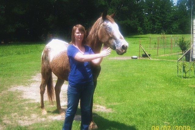 In this 2009 photo, at far left, contributing writer Lori Dunn poses with Shy Ann, her beloved Appaloosa. (CONTRIBUTED PHOTO)