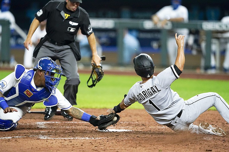 Royals catcher Salvador Perez tags out Nick Madrigal of the White Sox during the seventh inning of Friday night's game at Kauffman Stadium.