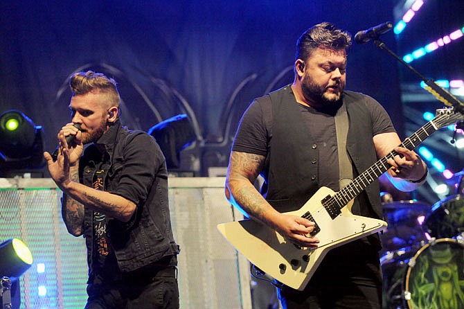 Members of the rock band Hinder play Saturday at the conclusion of the 2020 Jefferson City Jaycees Cole County Fair. Inclement weather earlier in the week impacted attendance, but organizers said Saturday's concert brought a crowd.