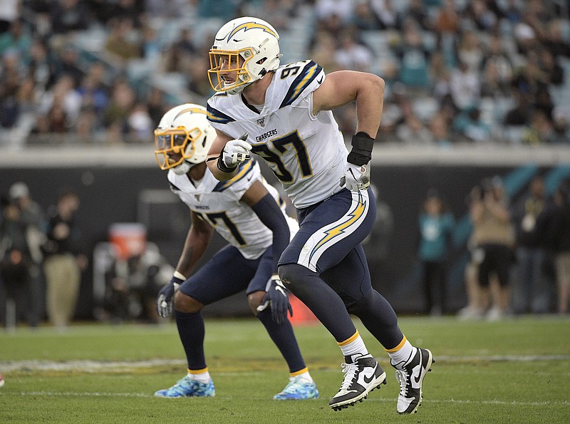 In this Dec. 8, 2019, file photo, Chargers defensive end Joey Bosa follows a play during the first half of a game against the Jaguars in Jacksonville, Fla. Bosa has agreed to a six-year, $135-million contract extension with the Chargers.