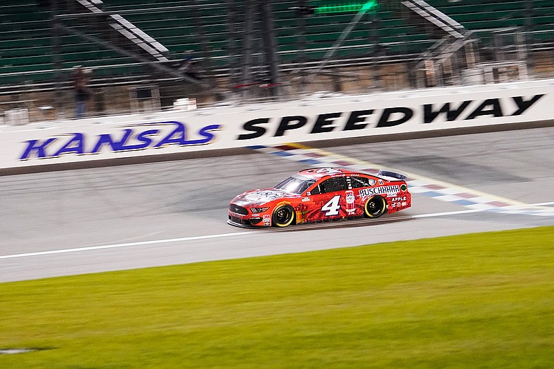 Kevin Harvick drives during a NASCAR Cup Series auto race at Kansas Speedway in Kansas City, Kan., Thursday, July 23, 2020. (AP Photo/Charlie Riedel)
