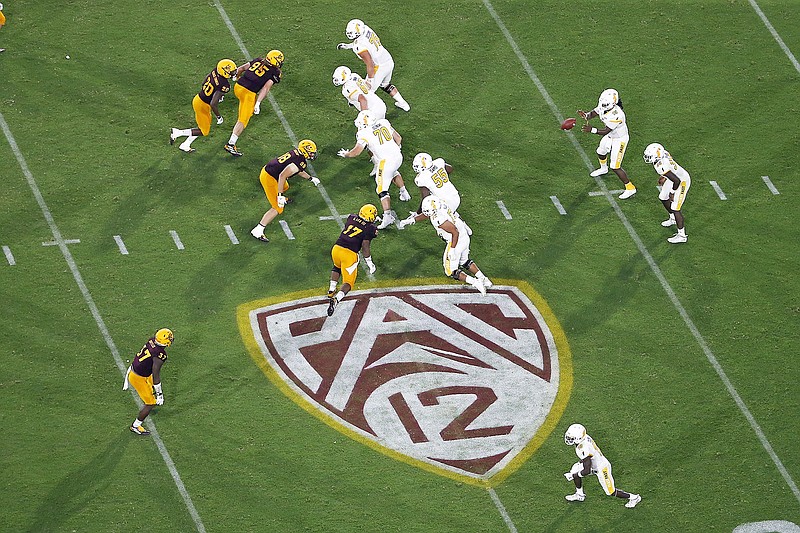 This Aug. 29, 2019, file photo, shows the Pac-12 logo during a game between Arizona State and Kent State in Tempe, Ariz.