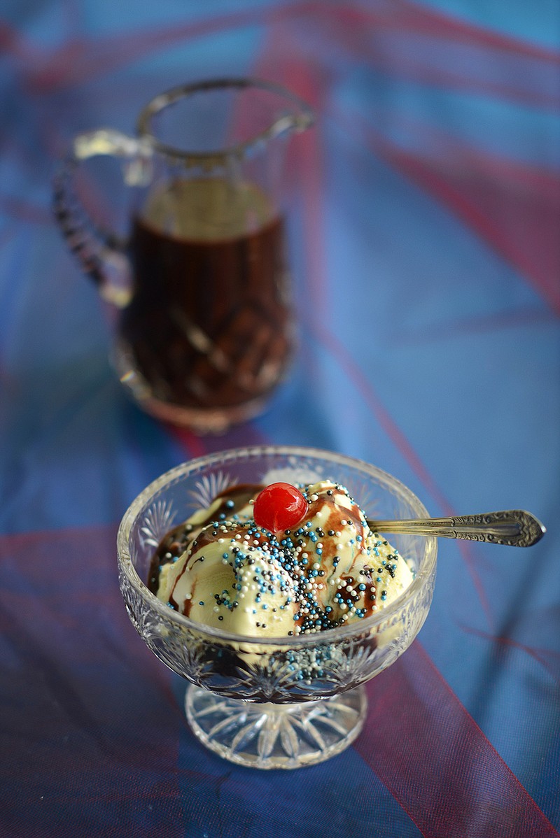 Nutella fudge sauce on banana ice cream, topped with sprinkles and a cherry create a unique flavor. (Lucy Schaly/Pittsburgh Post-Gazette/TNS)