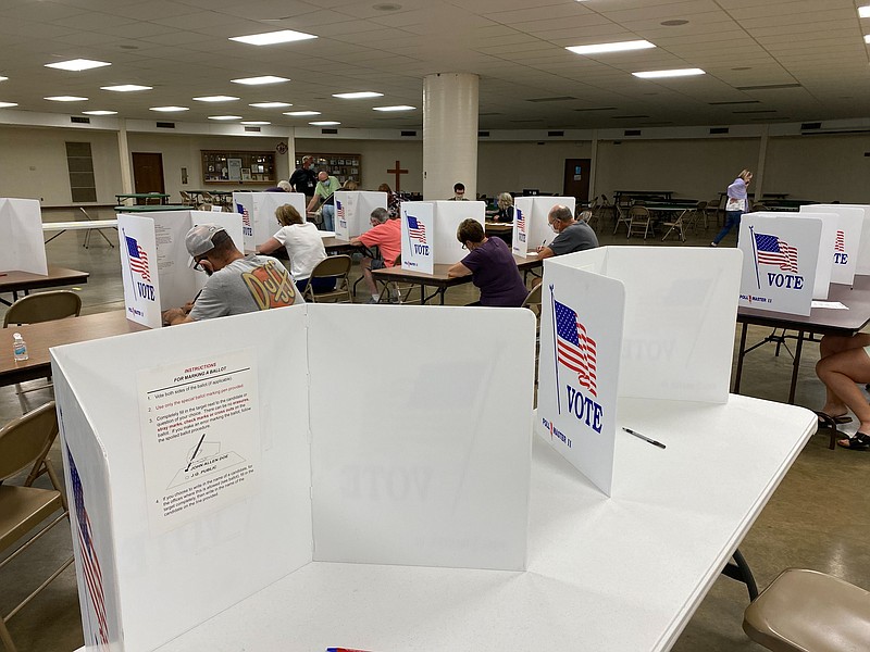 Voters at the Cathedral of St. Joseph polling location in Jefferson City cast their ballots in the Aug. 4, 2020, primary election.