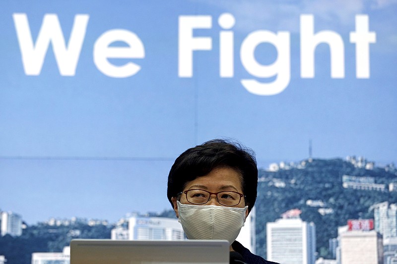 Hong Kong Chief Executive Carrie Lam announces to postpone legislative elections scheduled for Sept. 6, citing a worsening coronavirus outbreak during a press conference in Hong Kong, Friday, July 31, 2020. (AP Photo/Kin Cheung)