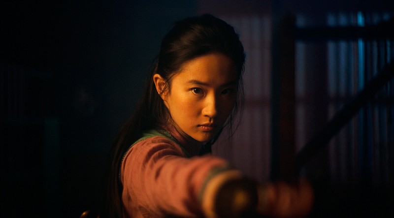 This image released by Disney shows Yifei Liu in the title role of "Mulan."  The film is no longer headed for a major theatrical release. The Walt Disney Co. said Tuesday that it will debut its live-action blockbuster on its subscription streaming service, Disney+, on Sept. 4. Customers will have to pay an additional $29.99 on top of the cost of the monthly subscription to rent "Mulan." (Disney Enterprises, Inc. via AP)