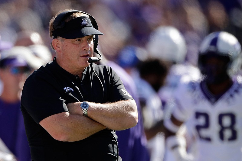  In this Oct. 19, 2019, file photo, TCU coach Gary Patterson watches during the first half of the team's NCAA college football game against Kansas State in Manhattan, Kan. TCU's chancellor said coach Gary Patterson apologized Monday, Aug. 3, 2020 for repeating a racial slur when telling a player to stop using the slur in team meetings. Linebacker Dylan Jordan accused Patterson on Twitter of using the slur during a confrontation at practice (AP Photo/Charlie Riedel, File)