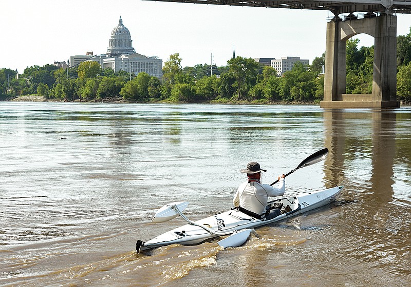 MR340 participant Gary Sanson, of Excelsior Springs, gets back on the water Wednesday morning, Aug. 5, 2020, after being among the early group of paddlers to first stop in or pass the Jefferson City checkpoint.