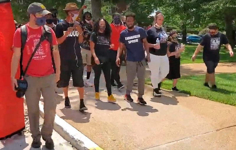 Protesters converged Thursday, Aug. 6, 2020, on the Missouri Capitol in opposition to Gov. Mike Parson's agenda for the special legislative session addressing violent crime. (From video by Jeff Haldiman/NewsTribune.)