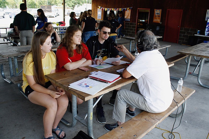 Fulton High School students Haisley Windsor, Paige Key and Jay Vegiard join KFAL's Steve Mallinckrodt live on the air during the 2019 Callaway County United Way Radiothon. Fulton Public Schools held penny drives to help raise money toward the Callaway County United Way kickoff.